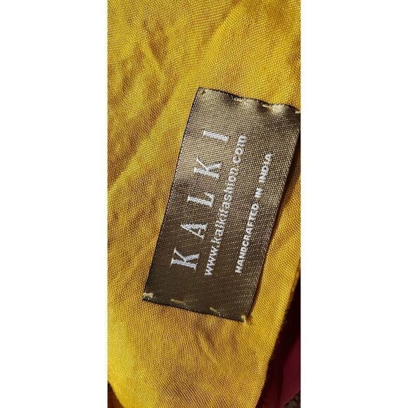 Kalki Fashion Traditional Skirt Set in mustard yellow with gold print - Picture 16 of 16